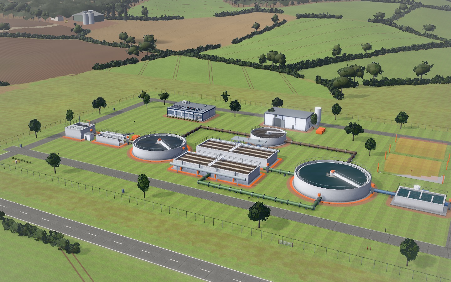 The finished treatment plant on its site beside the road, seen from above.